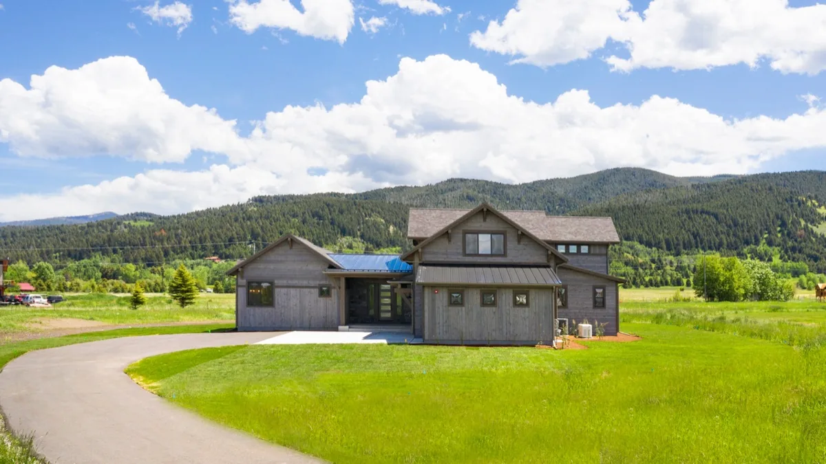 High Country, front elevation with the mountains behind it
